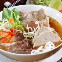 Spicy Noodles Soup/ Bun Bo Hue · Spicy noodles soup with beef shank, vietnamese meatloaf and pork blood