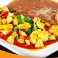 Primavera Enchiladas · 2 cheese enchiladas with ranchero sauce topped with vegetables. Served with rice and beans.