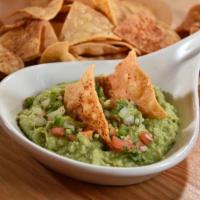 Guacamole · Fresh hass avocados, diced tomatoes, fresh cilantro, diced onions and jalapeno peppers.