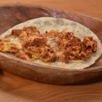 The Eggcellent Taco / Chorizo · Scrambled eggs, cheese, chorizo on a flour tortilla.