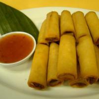 A1. Spring Rolls · 4 pieces. Crispy rolls; filled with shredded taro; serves with sweet & sour sauce.