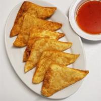 A2. Fried Wontons · 6 pieces. Wonton filled with ground chicken, onion, serves with sweet & sour sauce.