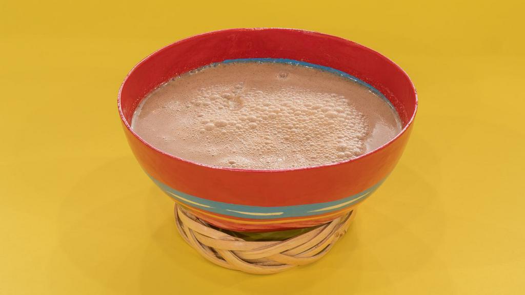 Tejate · Legend tells us it was once the drink of mesoamerican nobility. Today, El Tule restaurant is one of the only destinations where you'll enjoy this fermented cacao and maize flour concoction.
