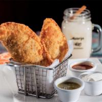 Empanadas · 2 classic crispy flour tortillas filled with seasoned ground beef, healthy vegetables, and n...