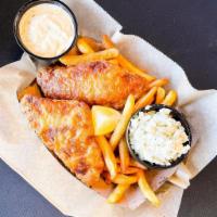 Ross's Fish n Chips · 2 pieces of flaky fried cod served with homemade tartar sauce, white slaw, fries, and a lemo...