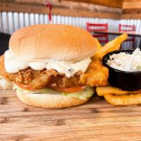 Pub Style Fried Fish Sammich · Crispy British pub style battered cod topped with tartar sauce, lettuce, and tomato
Served w...