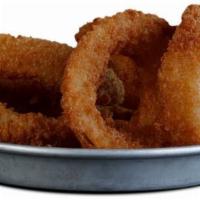 Onion Rings · Hand battered in shiner bock beer batter, deep-fried and served with our house-made chipotle...