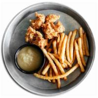 Kids Chicken Nuggets · Served with fries and a drink.
