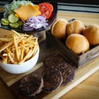 Burger Box · Feeds 4. Four homemade buns, 4 medium-well beef patties with cheddar cheese, toppings: lettu...