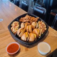 Tailgate Party Platter · Serves 6-8. American cheese sliders, Harlem chicken tenders, and mac n cheese. Served with c...
