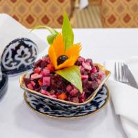 Vinaigrette Salad · Potatoes, carrots, red onions, pickles, sour cabbage, red beans and diced beets mixed with o...
