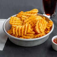 Waffle Cut Fries · Seasoned waffle cut fries tossed in our house seasoning with fry sauce.