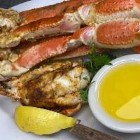 Snow Legs and Lobster Tail Combination · Broiled snow crab legs and lobster tail.