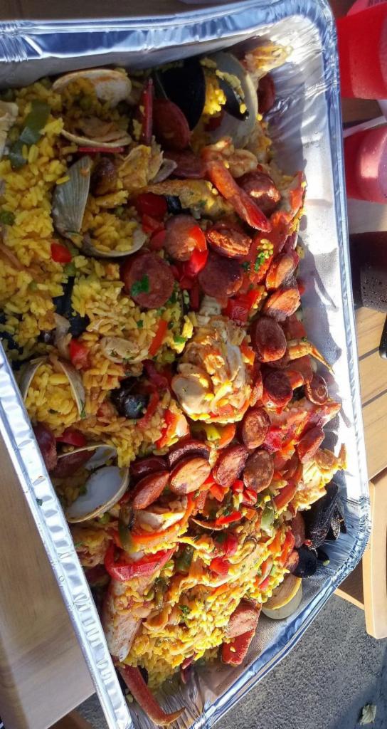 La Paella de Espana  · Chicken, jumbo shrimp, sea scallops, mussels, clams, king crab legs, snow legs, a...