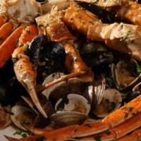 Our Italian Feast · Whole Maine lobster, shrimp, clams, scallops, mussels, snow crab legs, king crab legs, all s...