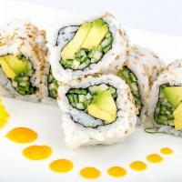 Avocado Roll · Cucumber and avocado in seaweed wrap.