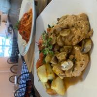 Pollo Al Marsala · Sautéed chicken breast, served with cremini and button mushrooms, and a splash of Marsala wi...