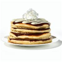 Cinn-A-Stack®Pancakes · Four buttermilk pancakes layered with cinnamon roll filling & topped with cream cheese icing. 