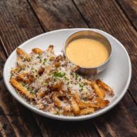 Truffle Cheese Fries · Truffle salt, parmesan, green onion, and white truffle cheese sauce.