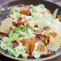 House Salad · Bibb lettuce, applewood bacon, hard boiled egg, heirloom tomatoes, garlic croutons and shave...