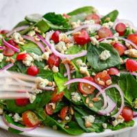 Spinach Salad · Spinach, red onions, Gorgonzola, red grapes and sunflower seeds, tossed in house vinaigrette...