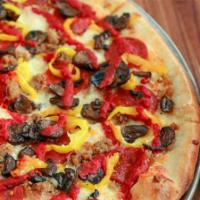 Large Classic Pie · pepperoni, sausage, roasted mushrooms, banana peppers & tomato sauce