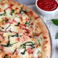 Large Margherita Pie · fresh mozzarella, fresh basil, parmesan, olive oil, fresh garlic & tomato sauce
