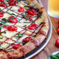 Large Mozzarella Caprese Pie · fresh mozzarella, tomatoes, fresh basil & balsamic reduction 