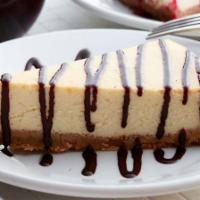 Cheesecake · New York style with a graham cracker crust. Made fresh in house.