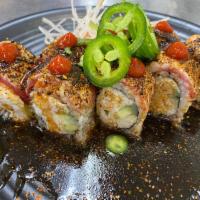 Pepe tuna roll · In- crabmeat, cucumber, avocado out- seared tuna with spicy ponzu sauce, eel, sriracha