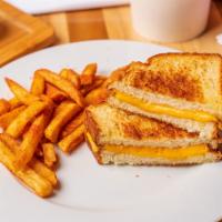 Grilled Cheese Sandwich · 2 slices of American cheese on a white toast.