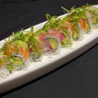The Trench Coat Roll · Yellowtail, avocado, wrapped with salmon and yellowtail, topped with micro-cilantro, Persian...