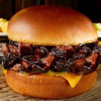 Brisket Burnt Ends Sandwich Plate · Chopped burnt ends of brisket with cheese & pickles on at toasted brioche bun, served with 2...