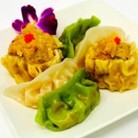 Dim Sum Sampler · Steamed Shrimp dumplings, vegetable dumplings and chicken dim sum