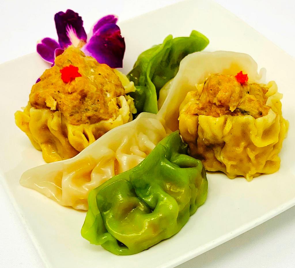 Dim Sum Sampler · Steamed Shrimp dumplings, vegetable dumplings and chicken dim sum