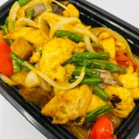 Thai Curry · Eggplant, potatoes, long beans, red onion, roasted sweet pepper and peanuts. 