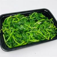 Sauteed Chinese Spinach · With fresh garlic.