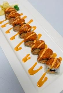 Lobster Roll · Lobster salad, topped with spicy crunchy tuna and tobiko. 