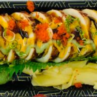 Calamari Dragon Roll · Grilled whole squid with seaweed salad, eel, avocado, caviar and chef's special sauce. 