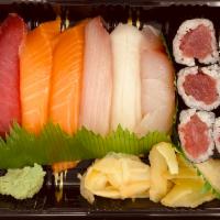 Sushi A Platter · Seven pieces of chef's choice with tuna roll. Served with miso soup or salad. 