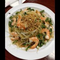 12. Goi Du Du Hoac Tom · Shredded green papaya salad with beef jerky or shrimp and peanuts.