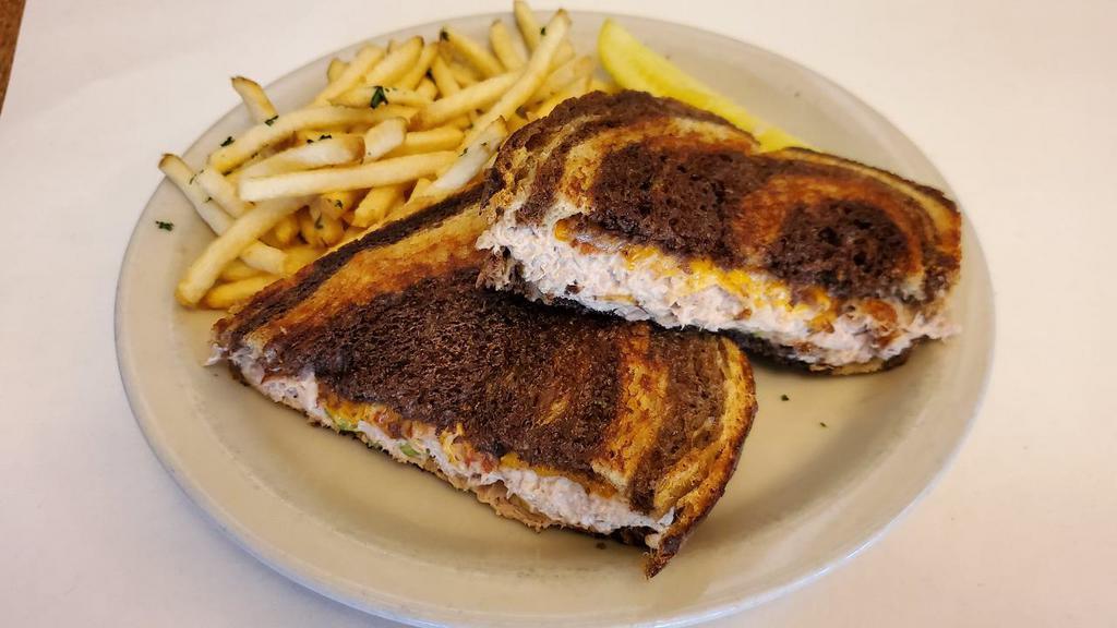 Tuna Melt* · Our Homemade Tuna Salad with melted Cheddar Cheese on grilled Rye Bread