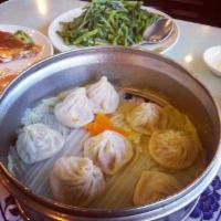 Steamed Dumplings(8) · with peanut oil.