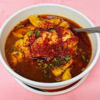 Boiled Fish Fillet in Chili Sauce · With a sauce made from chili peppers and seasoning. 