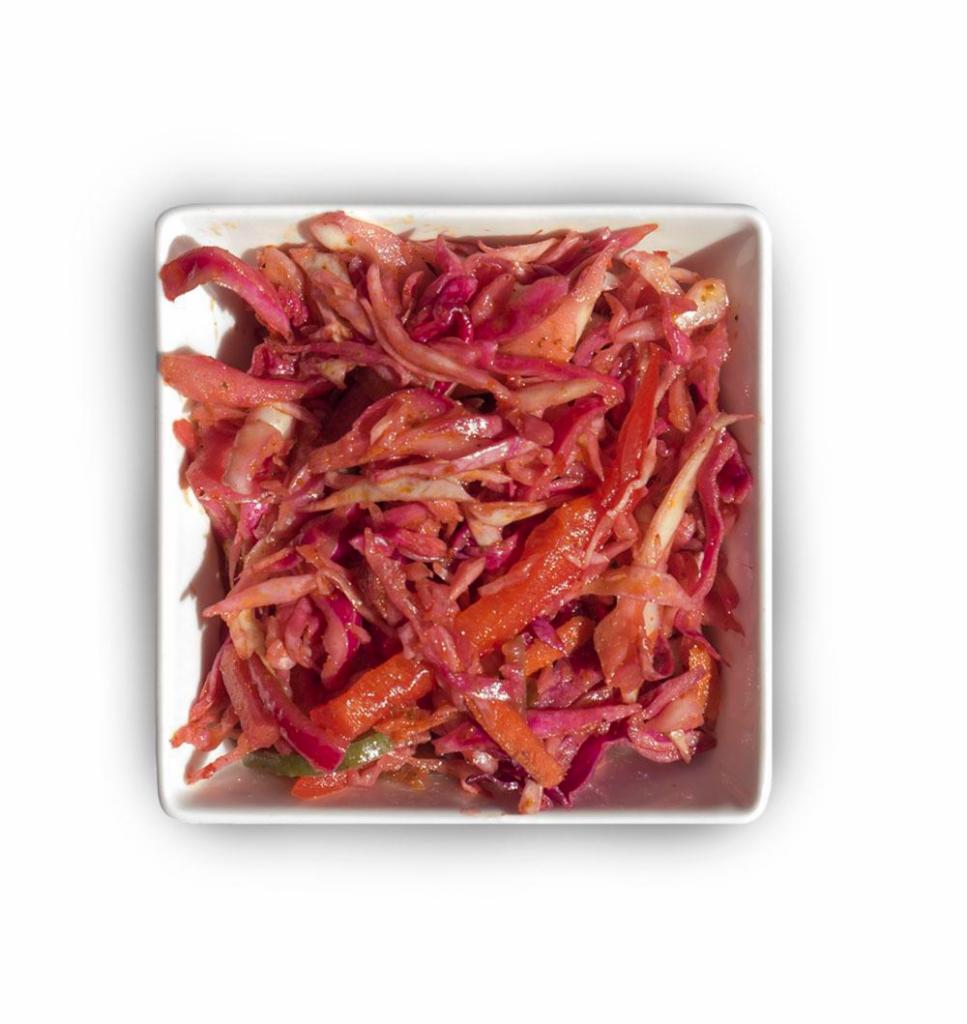 Side Mediterranean Slaw · Purple cabbage, bell peppers, mixed with herbs and spices!