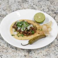 5 Tacos · 5 delicious tacos with your choice of protein, topped with cilantro and onion with a side of...