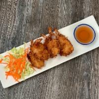 Coconut Shrimps (6) · Deep fried battered shrimps with coconut flakes. Served with sweet and sour dipping sauce.
