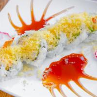 Shrimp Tempura Roll · Avocado, krab, cucumber and shrimp tempura roll topped with tempura flakes and eel sauce.