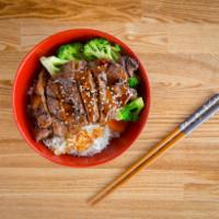 Beef Teriyaki Bowl · Rice topped with steamed cabbage, carrots, broccoli, and beef teriyaki.