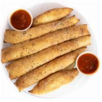Breadsticks · Brushed with garlic sauce, served with our homemade marinara sauce. 